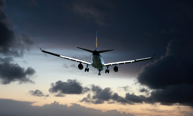 Plane in dark sky