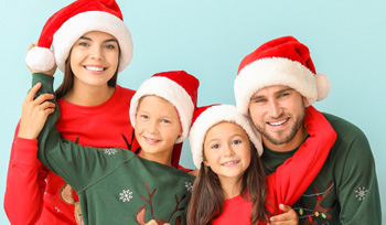 Family of 4 in Christmas hats Family of 4 in Christmas hats