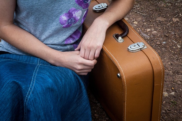 Person with a suitcase